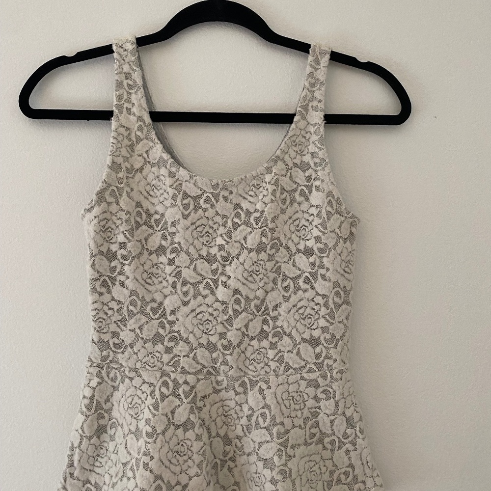 Express sleeveless lace peplum top